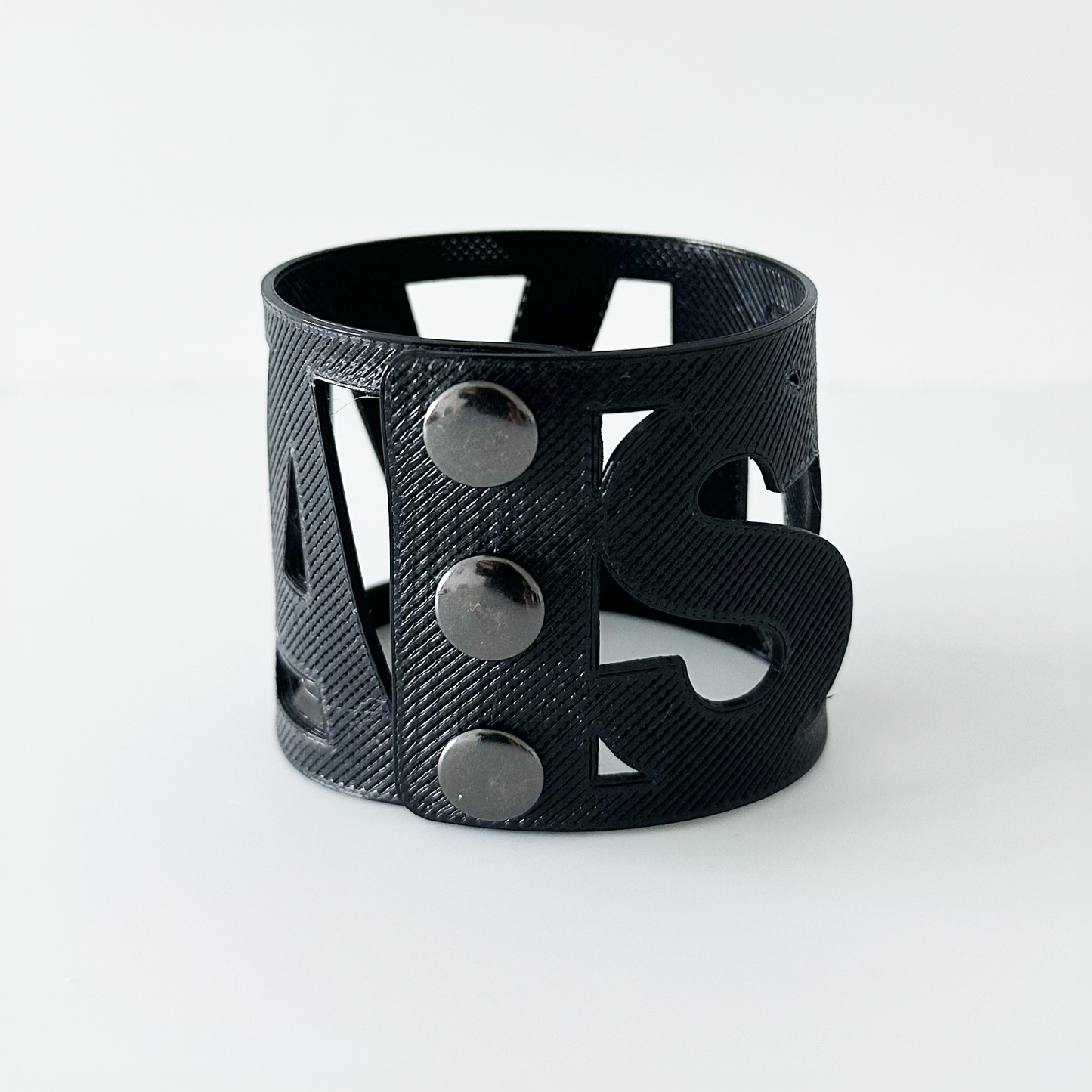 Custom 3D printed name or monogram cuff bracelet in black with 3 silver snaps.
